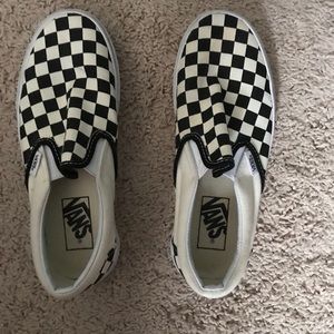 Woman’s checkered vans